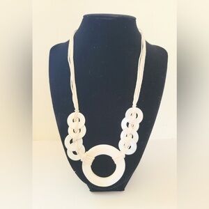 Shell like bead and cord necklace!